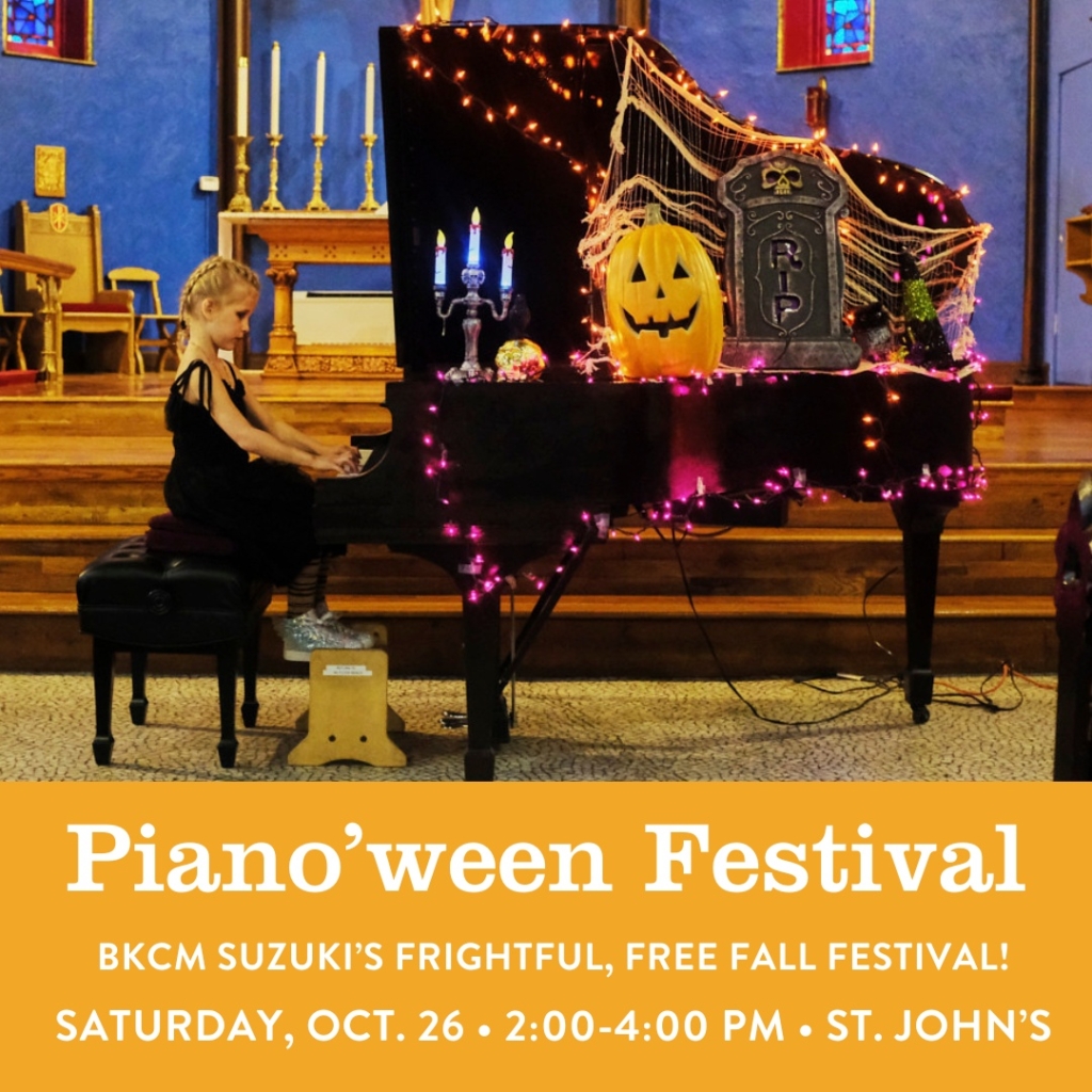 A BKCM Suzuki student plays the piano at the annual Piano'ween festival.