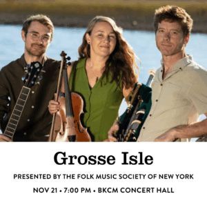 The three members of the band Grosse Pointe standing with their instruments in front of a body of water