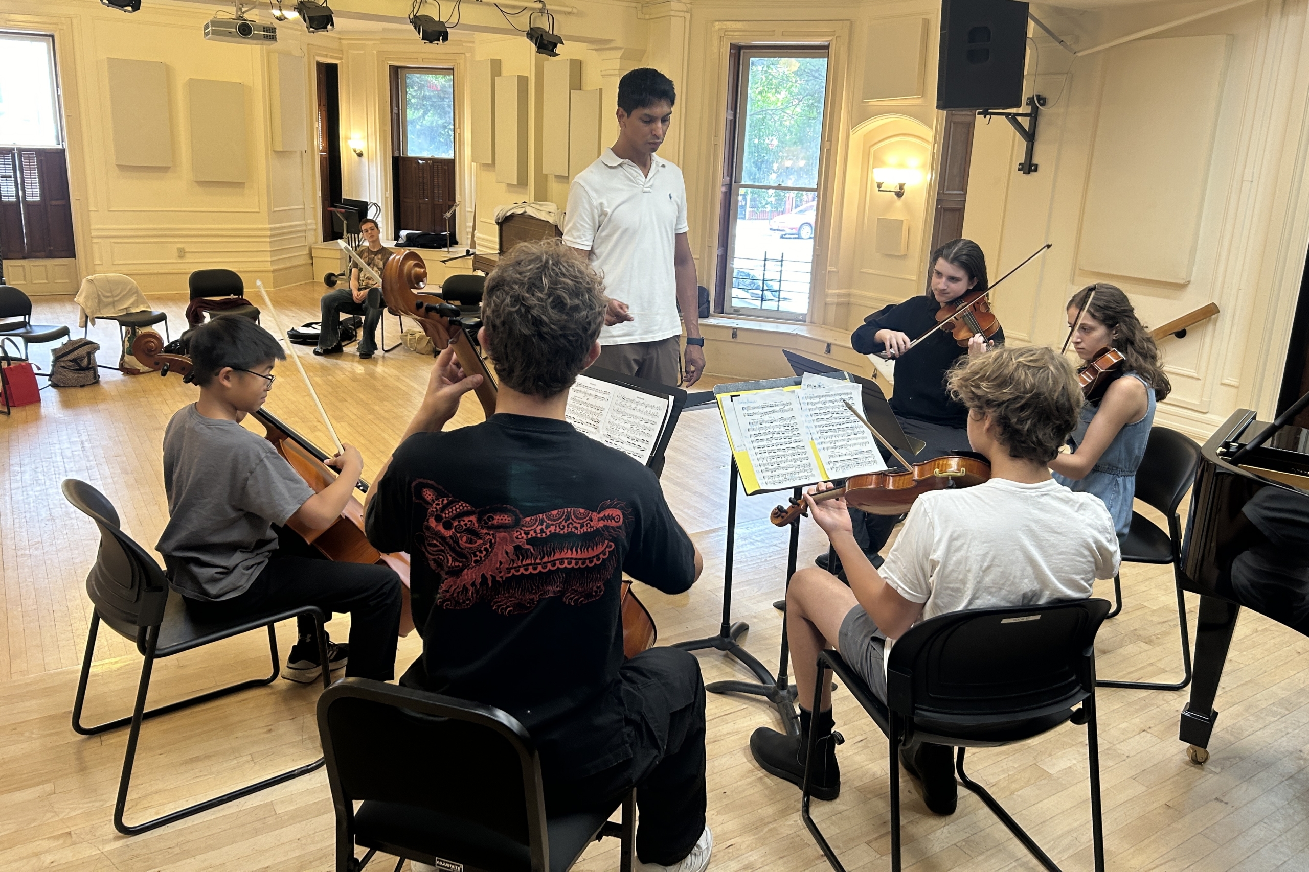 A quintet of strings players in the BKCM Concert Hall
