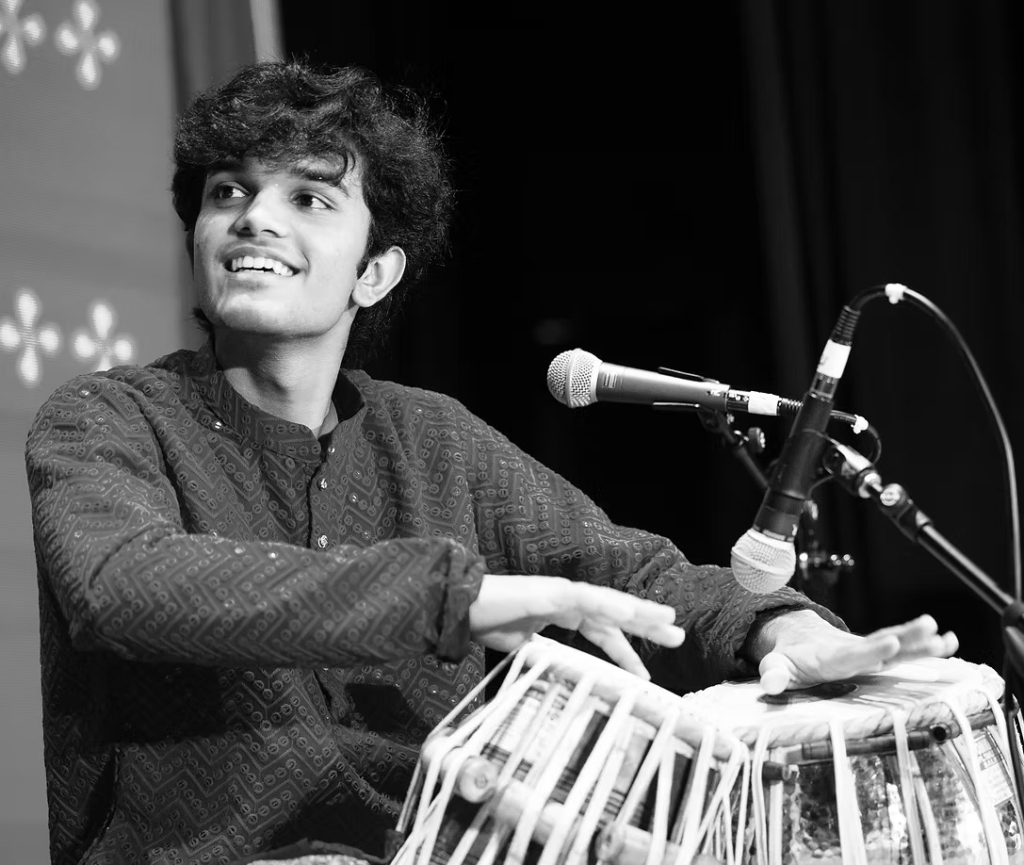 Photo of Vivek Pandya playing the tabla