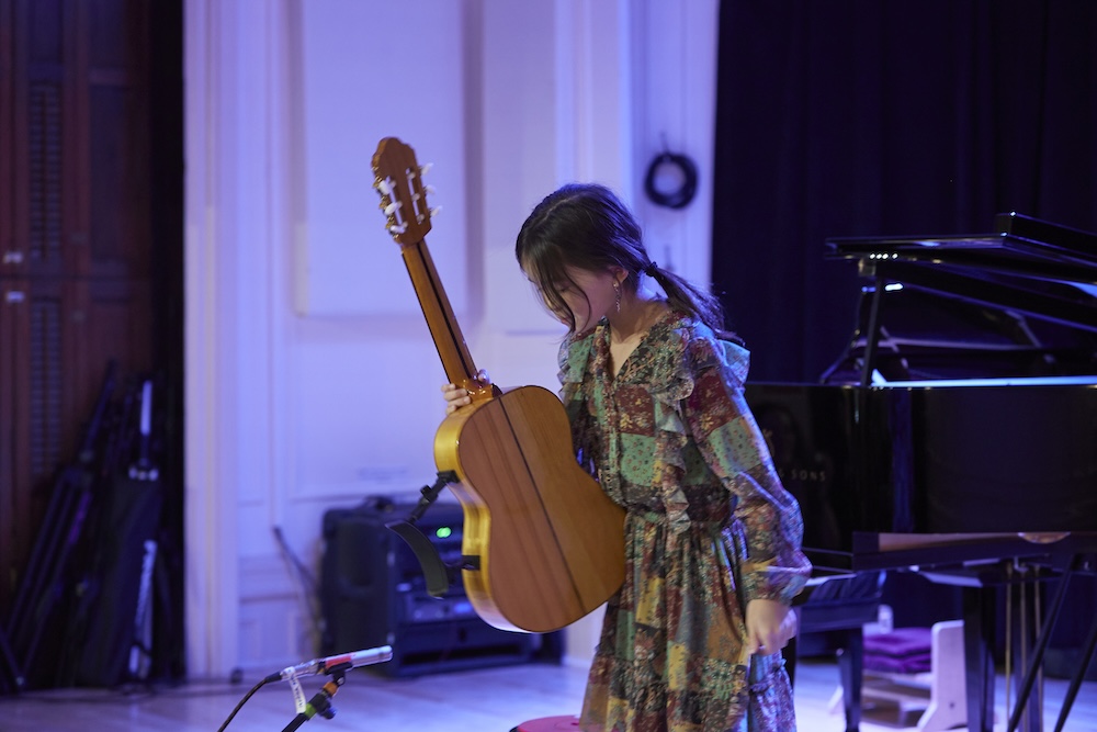 A Suzuki student taking a bow
