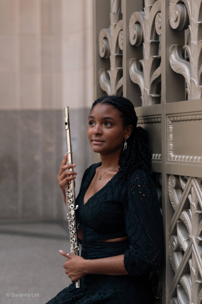 A photo of Alexandria DeWalt and her flute.