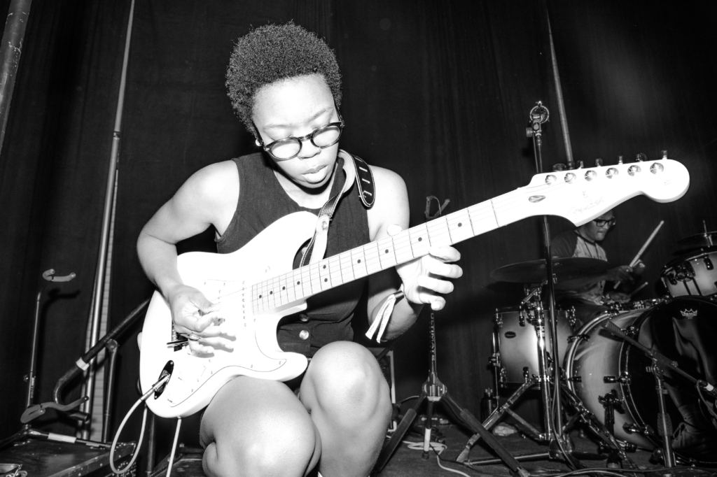 Musician alana amore colvin playing the guitar