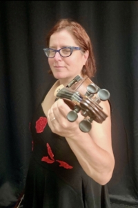 Melody Allegra Berger with a fiddle