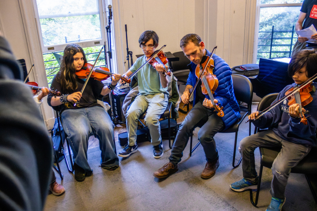 A group of students playing at Open Stages