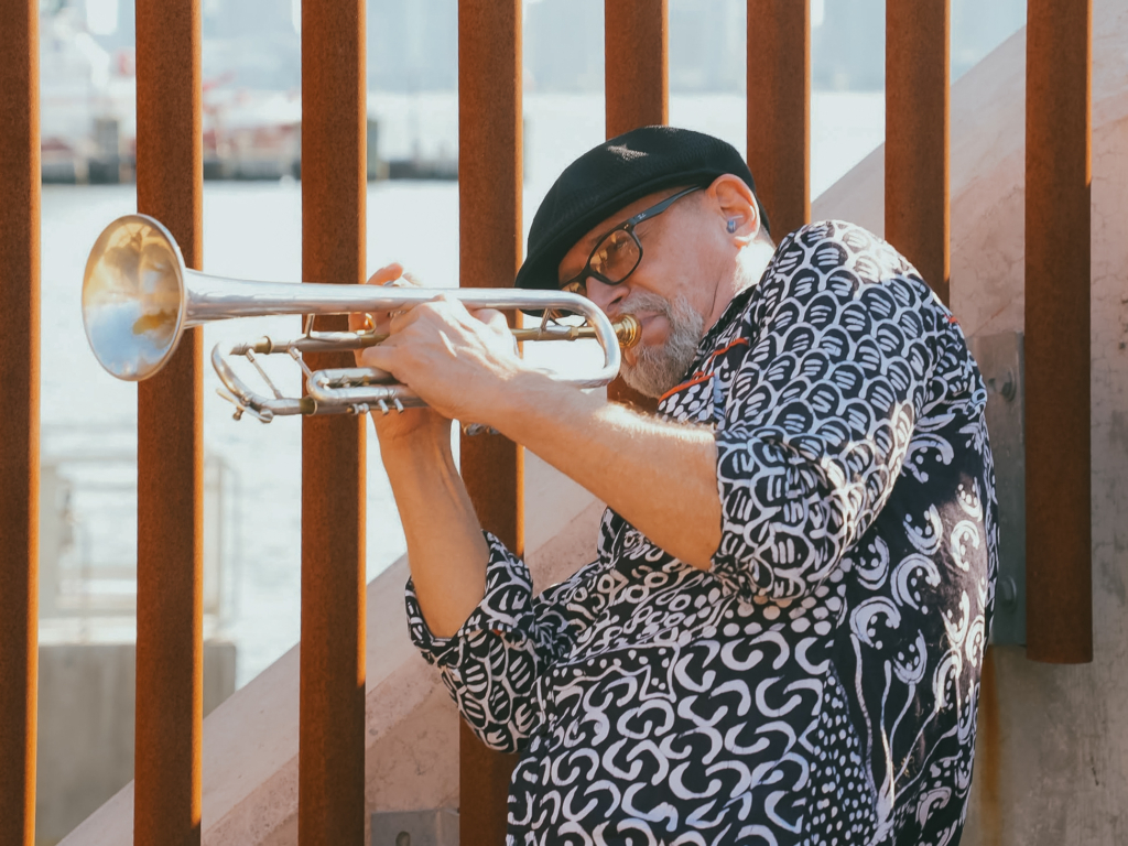 A photo of Jim Seeley playing the trumpet